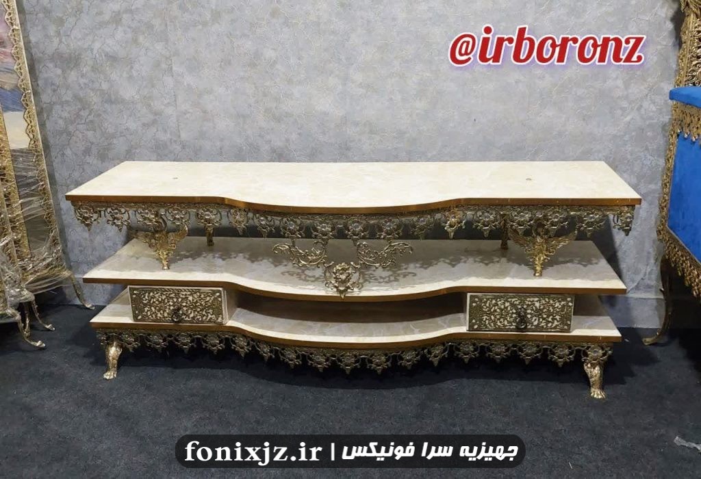 میز تلویزیون برنزی مدل جلو خم تسمه گل آفتاب گردان